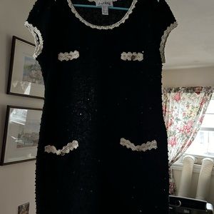 Mint condition Joseph Ribkoff knit dress with subtle sequins throughout.
